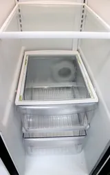 Frigidaire FFHS2311LBE Side-by-Side Refrigerator 22.1 cu ft Ice Dispenser