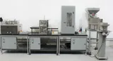Landry Engineering Filling Station with TechnaVibes Feeders for Syringes