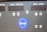 Harland Sirius Pressure-Sensitive Labeling Machine with Conveyor System
