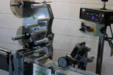Harland Sirius Pressure-Sensitive Labeling Machine with Conveyor System