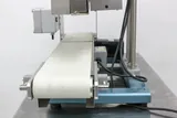 APM TCBSDM.3/8.6X3 Table Top Conveyorized Band Sealer 35 FPM