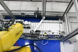 IDI interactive Design Pick and Place Robot Cell with FANUC System