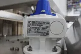 Apex Cap Elevator with Automated Sorting and Transport System