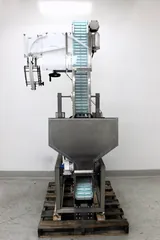 Apex Cap Elevator with Automated Sorting and Transport System