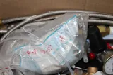 N/A n/a Box of Misc. Parts Gas Regulators Clamps and Hoses Fair Condition