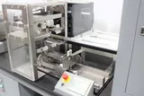 Landry Engineering Filling Station with TechnaVibes Feeders for Syringes