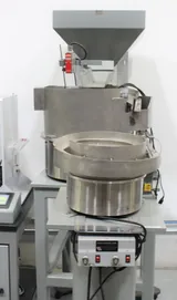 Landry Engineering Filling Station with TechnaVibes Feeders for Syringes