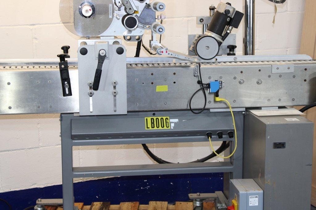 Harland Sirius Pressure-Sensitive Labeling Machine with Conveyor System