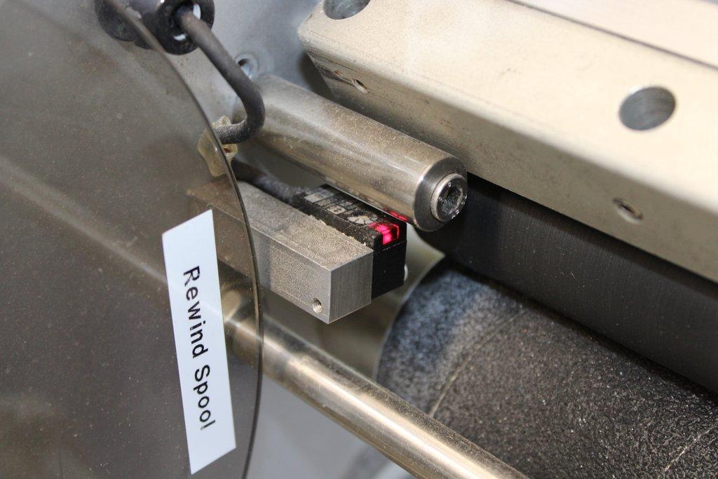 Harland Sirius Pressure-Sensitive Labeling Machine with Conveyor System