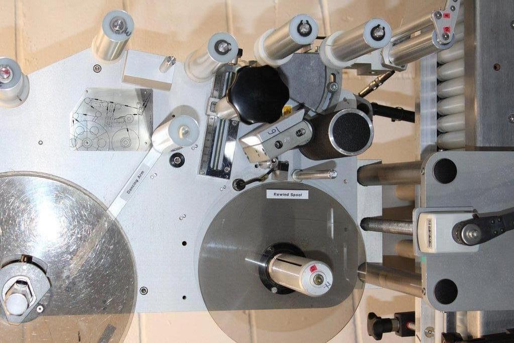 Harland Sirius Pressure-Sensitive Labeling Machine with Conveyor System